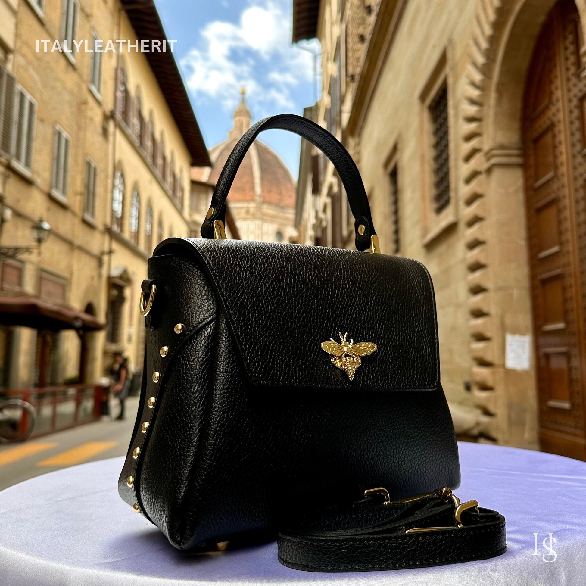 Borse da donna in pelle fatte a mano in Italia l l Elegante borsa in pelle da Firenze con chiusura a moschettone a forma di ape